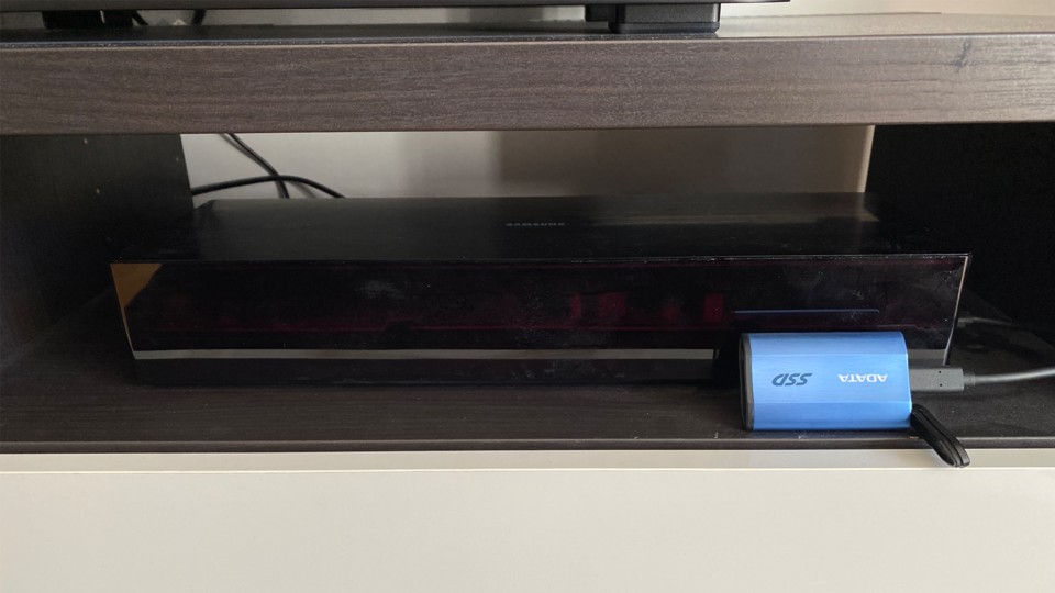 The One Connect box from Samsung is about 45 centimeters long.  Not in the picture: the fiber optic cable to the TV.