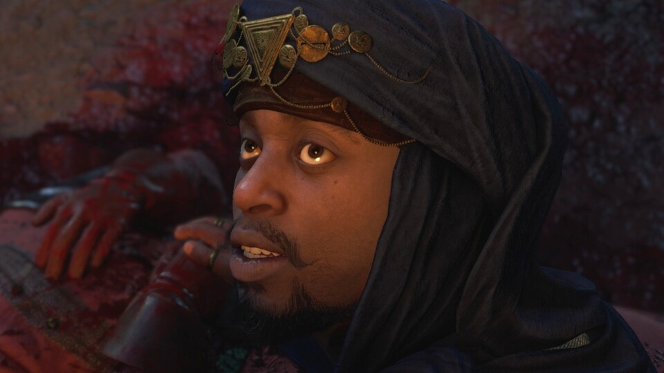 Musa trägt eine nachtblaue Kopfbedeckung und Tunika. In seiner Heimat, dem Königreich von Mali, war Indigo als Farbstoff leicht verfügbar.