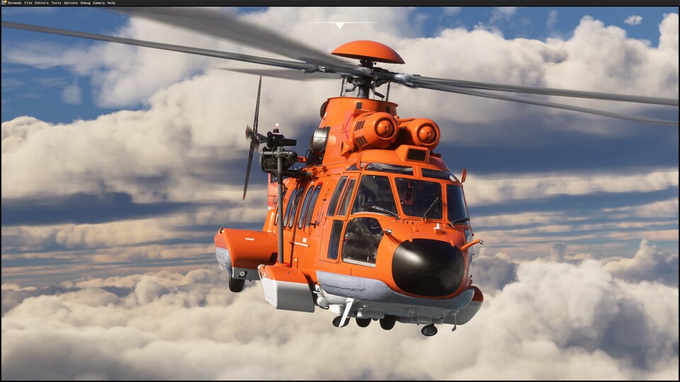 Sehr gut sind hier die beiden Triebwerke über dem Kabinendach zu sehen.