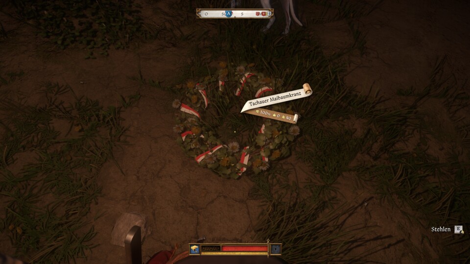 In der Dunkelheit ist der Kranz am Boden schwer zu erkennen. Vergesst ihn nicht.