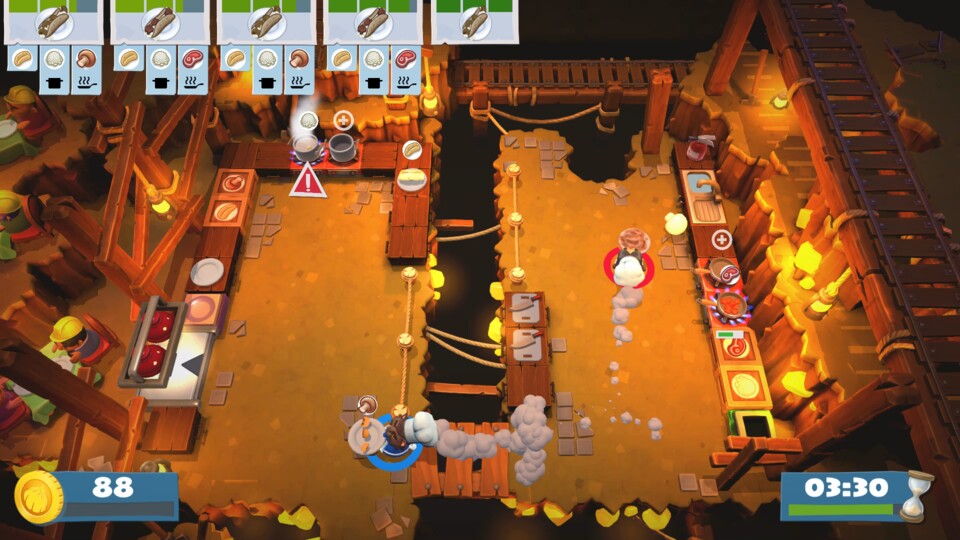 Links wird gekocht, rechts gebraten und geschnippelt. Teamwork ist in Overcooked 2 sehr wichtig.