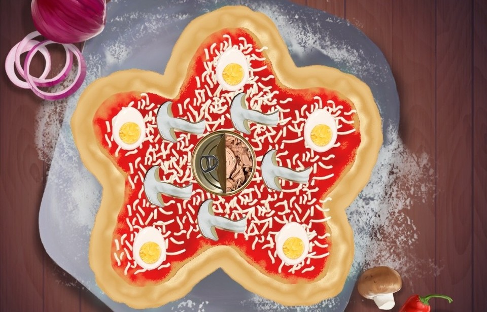 Eine widerliche Kreation: Unsere Pizza GameStar ist schön sternförmig und das Kronjuwel ist die komplette Dose Thunfisch in der Mitte. Wohl bekomm's!