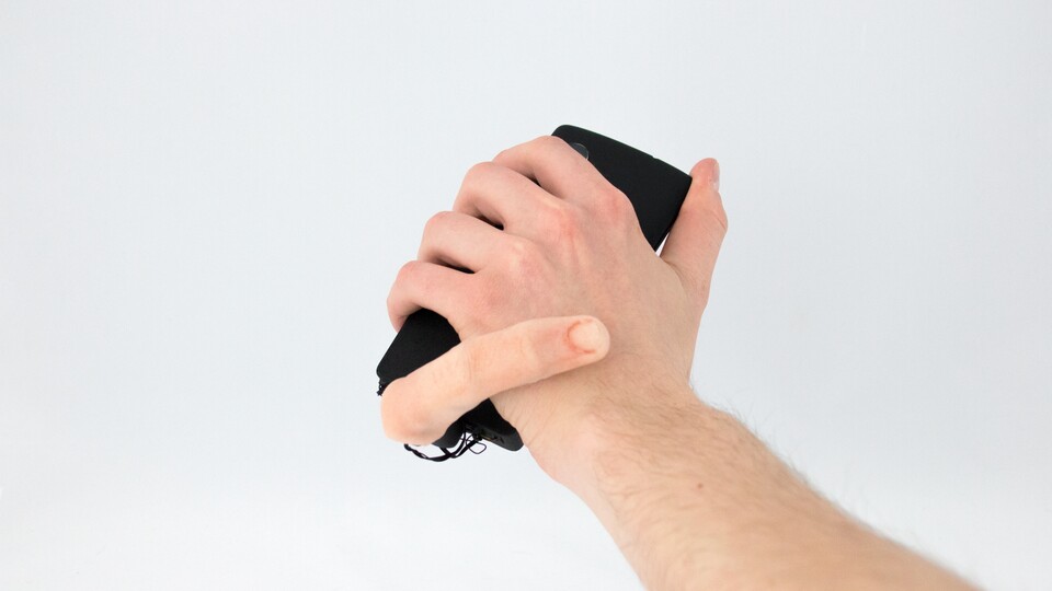 Ein Roboterfinger am Smartphone kann den Nutzer streicheln. (Bildquelle: Marc Teyssier)