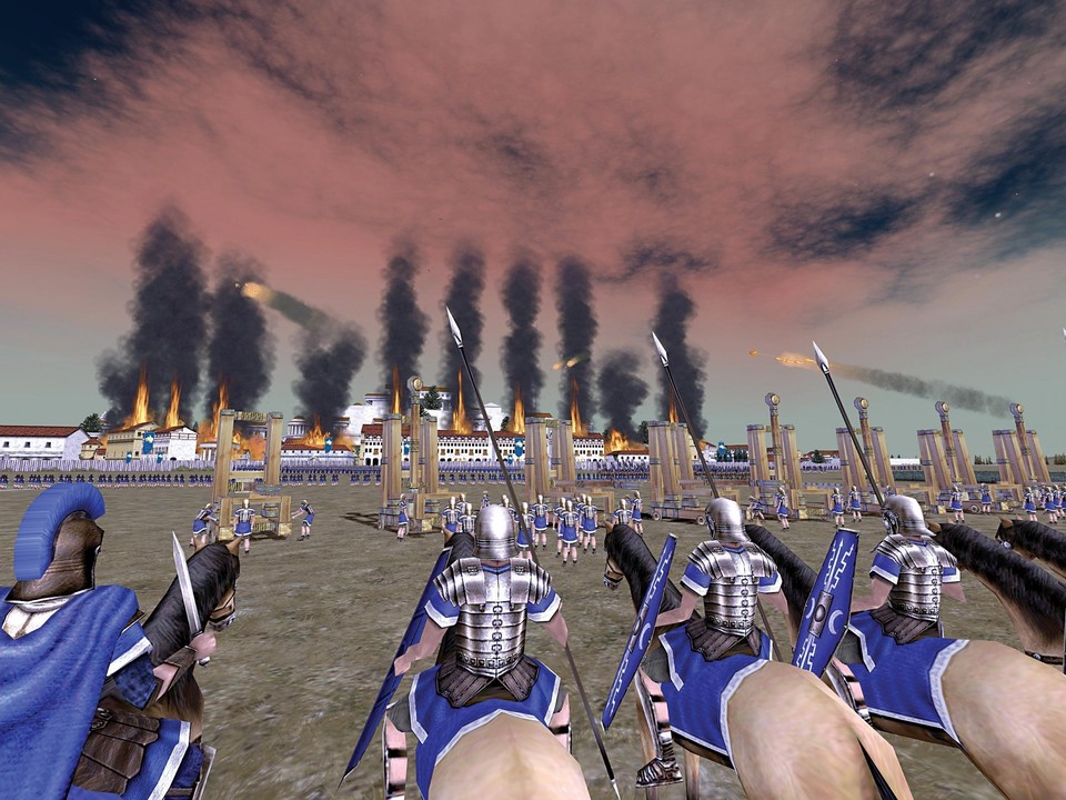 Katapulte schießen eine Stadt sturmreif. An vorderster Front warten Legionäre auf die Gelegenheit zum Durchbruch. Der General links wartet lieber im Hintergrund.