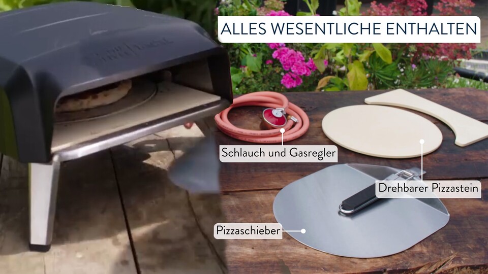 Zum Ofen gibts neben den Essentials wie Gasschlauch, -regler und dem Pizzastein auch einen klappbaren Pizzaschieber – praktisch!