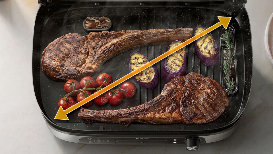 Die großzügige Grillfläche bietet genug Platz für ein Essen zu viert.