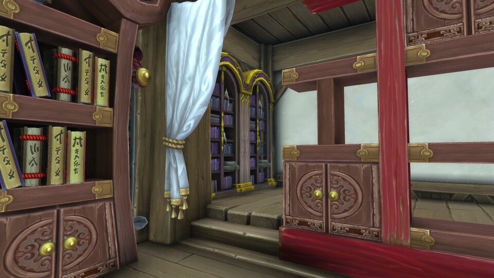 Ein Beispiel für Ebenenbau: Die Bücherregale sind hinter dem Vorhang und dem Regal, und gleichzeitig von ihnen eingerahmt.