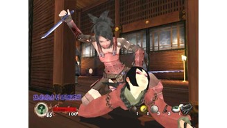 Ayame (dressed in her Ninja Armor) performing a stealth kill on an enemy Kunoichi in Gohda Castle.
