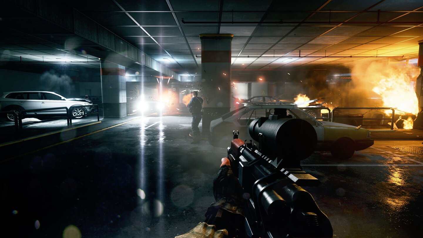 Battlefield 3Durch die Tiefgarage haben wir uns im Koop-Modus geballert - so hübsch wie auf dem Screenshot sind die Lichteffekte der gezeigten PS3-Version aber lange nicht.