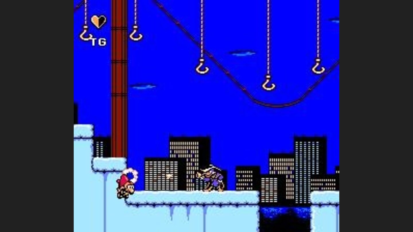 Darkwing Duck shoots enemy.