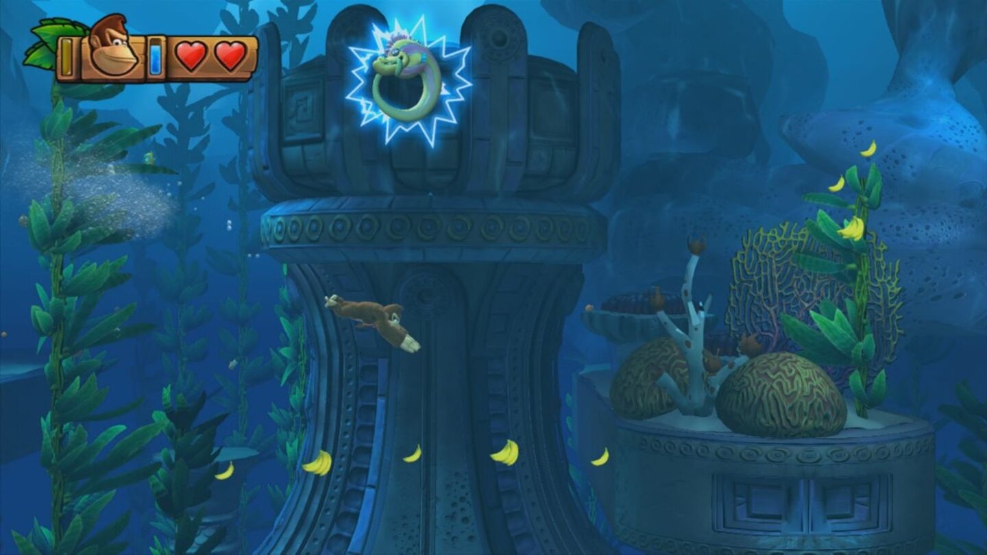 Donkey Kong Country: Tropical FreezeUnter Wasser geht uns jetzt im wahrsten Sinne des Wortes die Luft aus - angezeigt durch eine blaue Leiste. Mit Luftblasen füllen wir sie wieder auf.