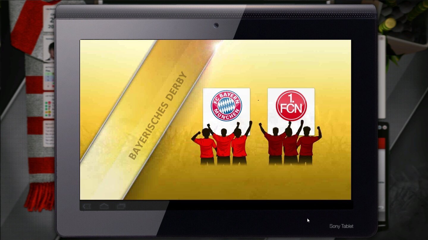 Fussball Manager 12Auf besondere Spiele weist ein kurzer Trailer auf dem Tablet hin.