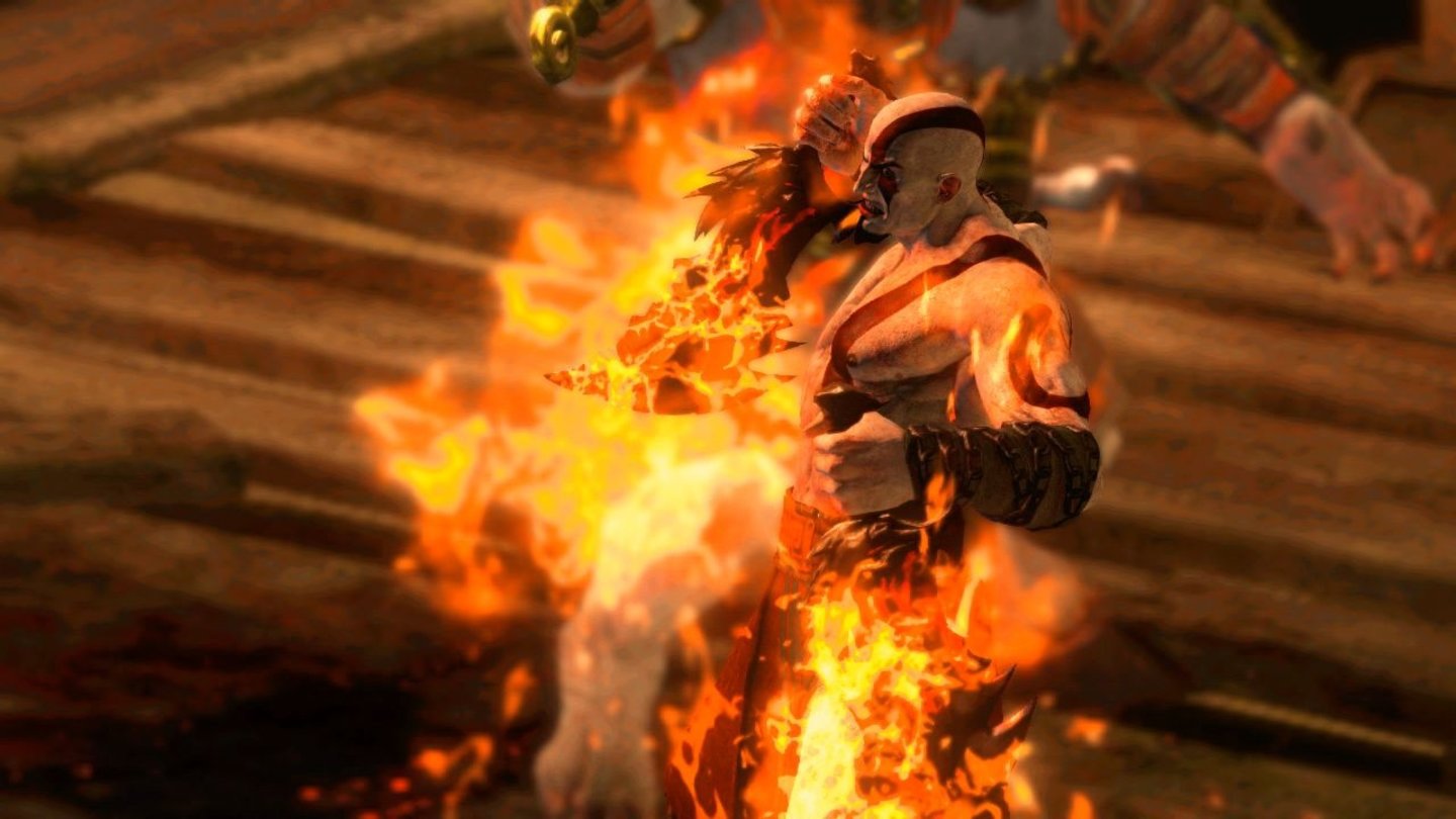 God of War: AscensionKratos lädt seine Chaosklingen mit göttlicher Energie auf, um ein Feuerinferno zu entfesseln.