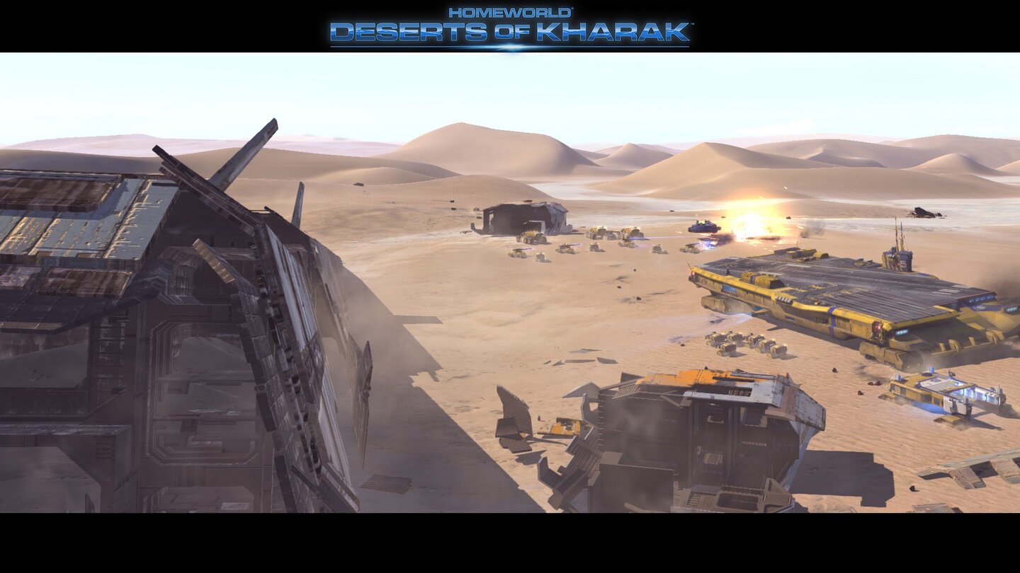 Homeworld: Deserts of KharakIn der Wüste liegt das Wrack eines Raumschiffs, es ist umkämpft. Im Hintergrund ist ein Trägerfahrzeug zu sehen.