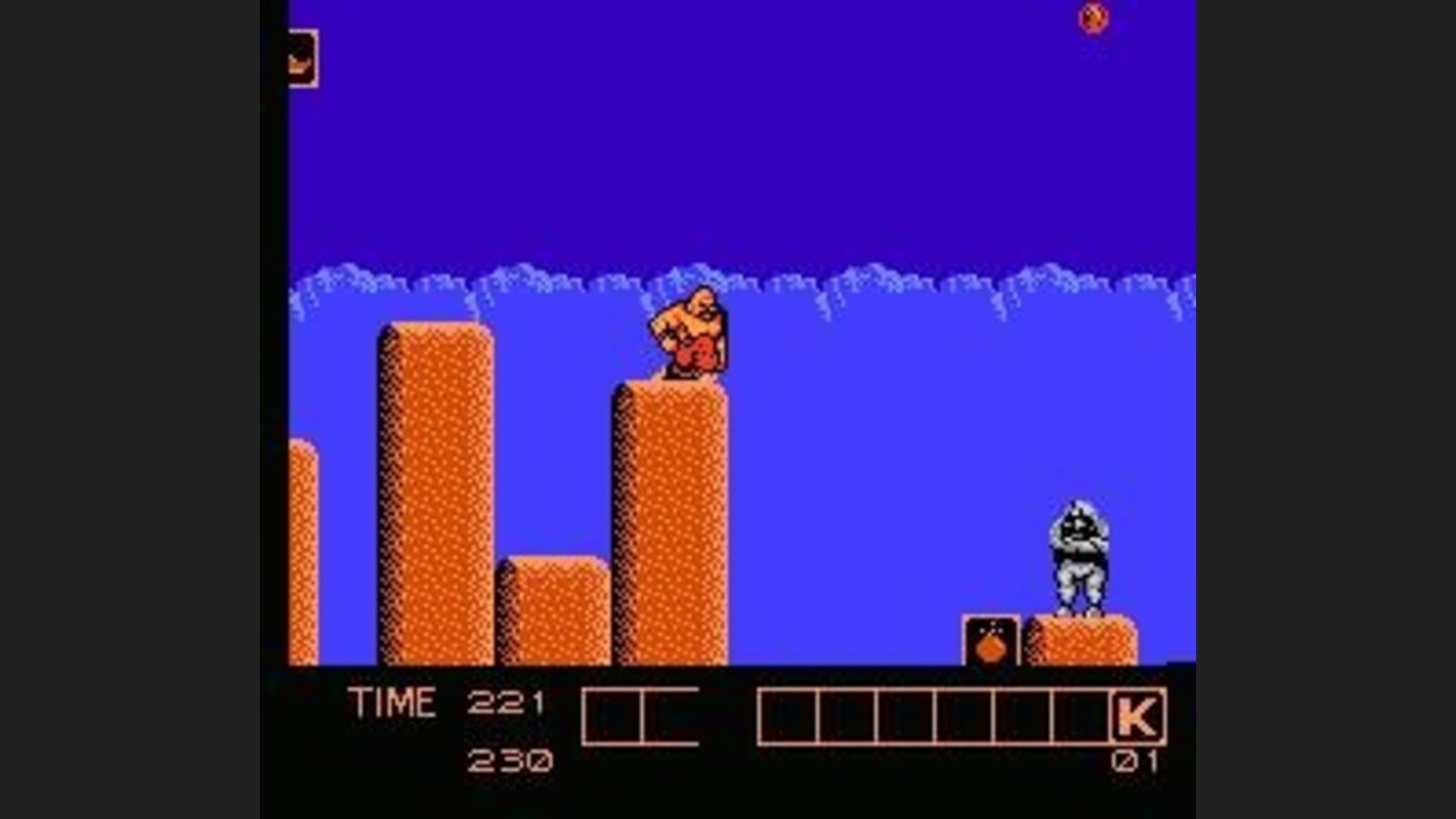 Crouching on pillar; rock chucker in view