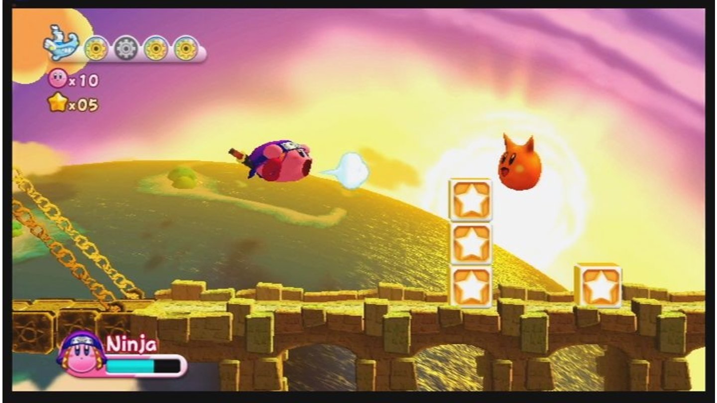 Kirby's Adventure WiiEs hüpft sich doch gleich viel angenehmer durch die prächtigen Wolken, wenn im Hintergrund die Sonne majestätisch untergeht.