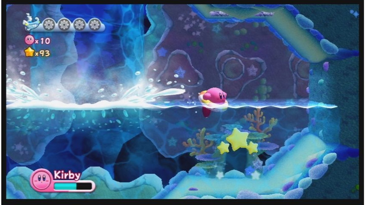 Kirby's Adventure WiiAuf dem Wasser treibt die rosa Knutschkugel mit einem Schwimmring, während sie unter Wasser eine schicke Taucherbrille trägt.