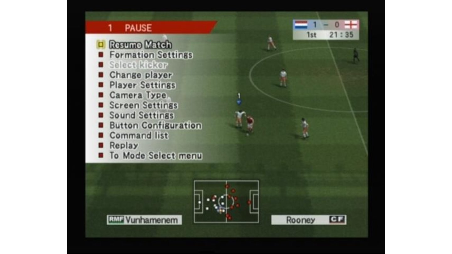 In-game menu pauses the game and gives you a whole set of options to change (that's also how you change players and tactics in the middle of a game)