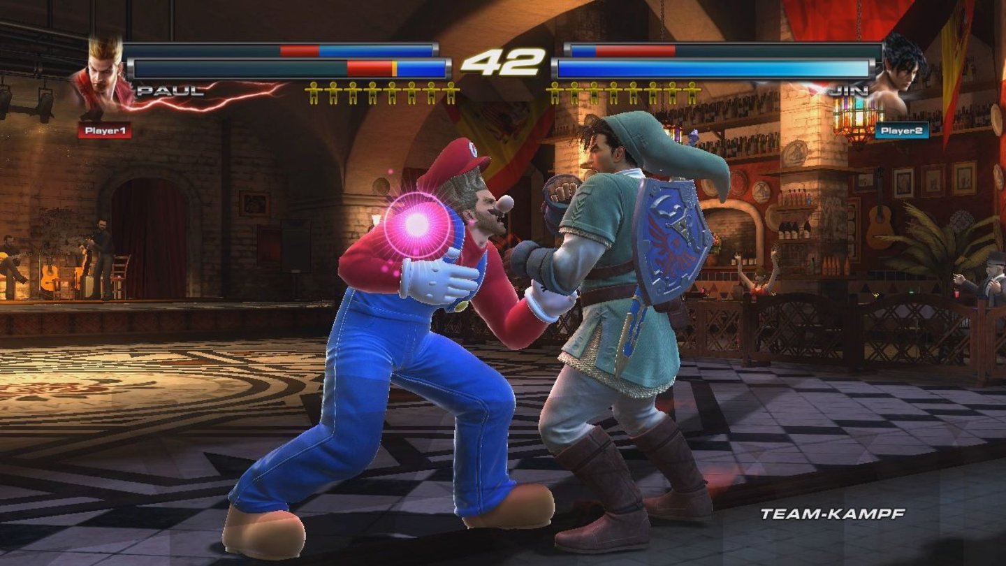 Tekken Tag Tournament 2 (Wii U)Pauls Frisur samt Mario-Mütze stehen ihm wirklich ausgezeichnet. Aber auch die Jin-Variante von Link kann sich sehen lassen.