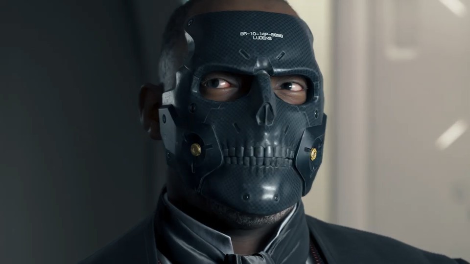 Der Mann mit dem sehr Kojima-esquen Namen versteckt sich hinter einer Maske.