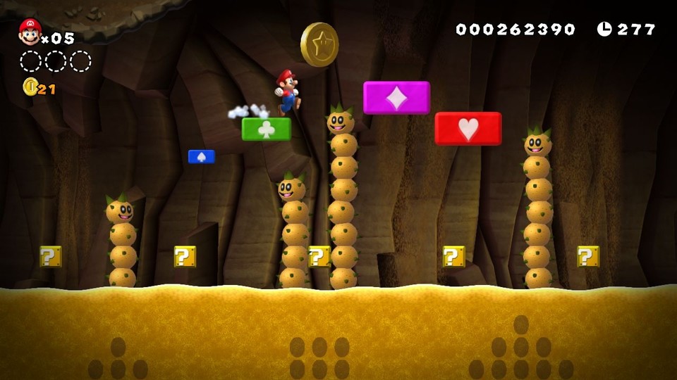Mit dem Touchscreen des neuen Wii U Gamepads bauen wir Mario eine Brücke über die stachligen Kugel-Kakteen.