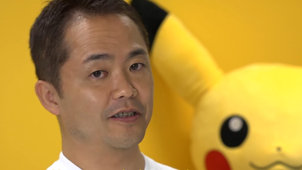 Pokémon-Director, -Producer und Komponist Junichi Masuda (vor Pikachu)