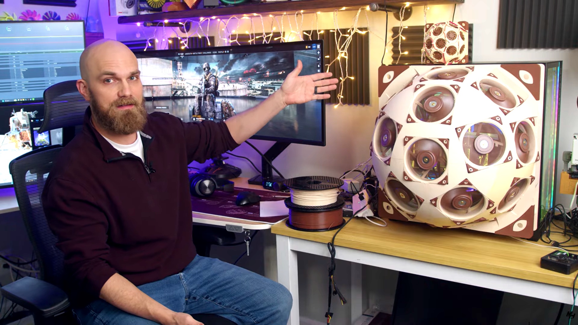 User schraubt das Glas-Panel seines Rechners ab und ersetzt es durch einen 'Superdome' aus 15 Lüftern - kühlt damit seinen PC um satte 20 Grad